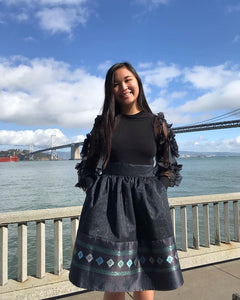 Black skirt by the Bay Bridge